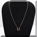 J013. 14K white gold and diamond horseshoe pendant on 17” faceted ball chain - $175 